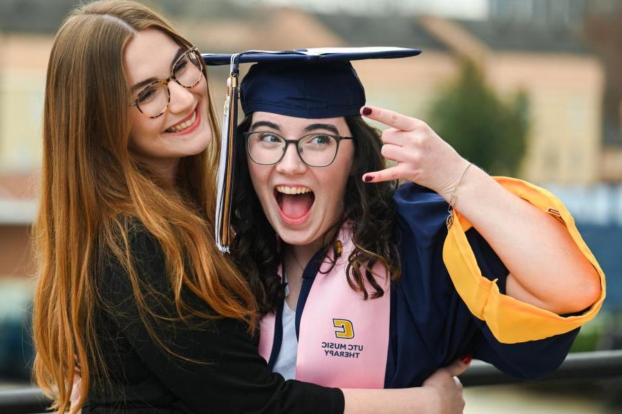 UTC music therapy student in graduation cap and gown